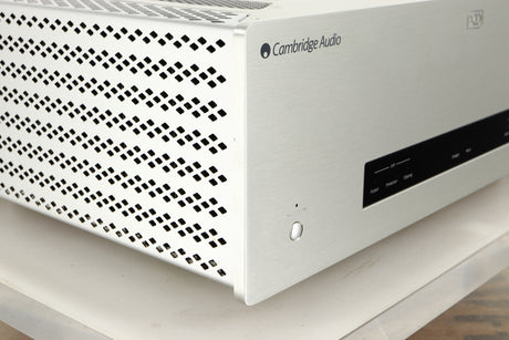 Front left corner of a used Cambridge Audio 851W Power Amplifier in a silver finish