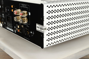 Rear left corner of a used Cambridge Audio 851W Power Amplifier in a silver finish