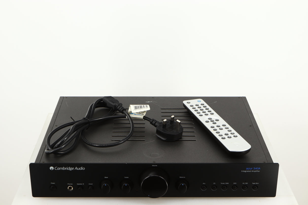 Top of a used Cambridge Audio 340A Integrated Amplifier in a black finish showing Remote and Mains Cable