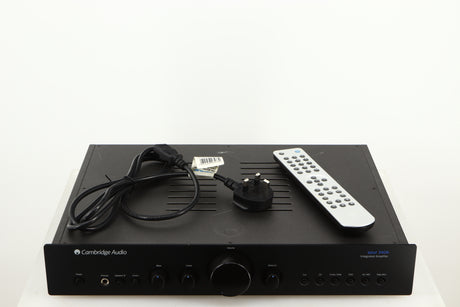 Top of a used Cambridge Audio 340A Integrated Amplifier in a black finish showing Remote and Mains Cable