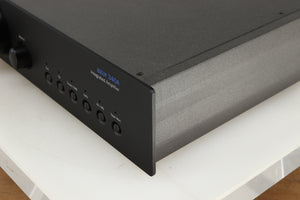 Front right corner of a used Cambridge Audio 340A Integrated Amplifier in a black finish
