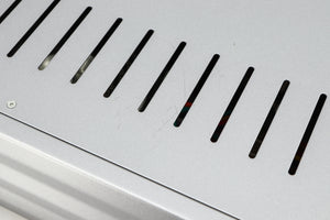 Close up of a used Cambridge Audio Azur 640A Integrated Amplifier in a silver finish showing scratching on top