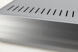 Close up of a used Cambridge Audio Azur 640A Integrated Amplifier in a silver finish showing scratching on right side