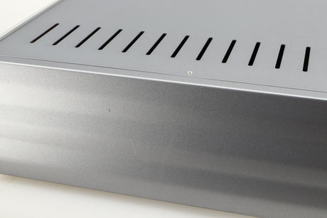 Close up of a used Cambridge Audio Azur 640A Integrated Amplifier in a silver finish showing scratching on right side