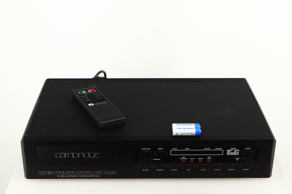 Top of a used Cambridge Audio CD2 CD Player in a black finish showing Remote and 2x Batteries