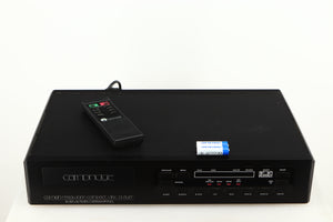 Top of a used Cambridge Audio CD2 CD Player in a black finish showing Remote and 2x Batteries