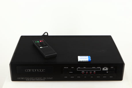 Top of a used Cambridge Audio CD2 CD Player in a black finish showing Remote and 2x Batteries