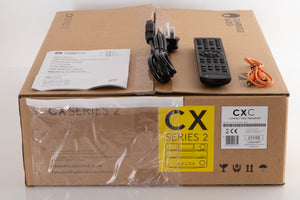 Box of a used Cambridge Audio CXC GEN2 CD Transport with mains cable, manual, remote, and control bus cable