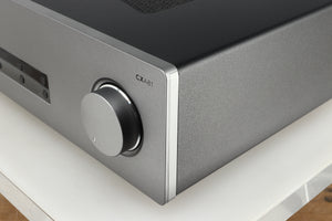 Front right corner of a used Cambridge Audio CXA81 GEN2 Integrated Amplifier in a lunar grey finish
