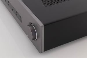 Front right corner of a used Cambridge Audio CXA81 Integrated Amplifier in a Lunar Grey finish