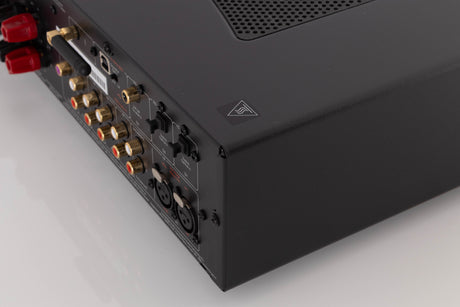 Rear left corner of a used Cambridge Audio CXA81 Integrated Amplifier in a Lunar Grey finish