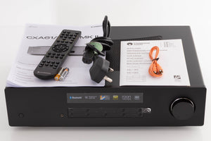 Top of a used Cambridge Audio CXA81 Series 2 Integrated Amplifier in a Black finish Remote, Batteries, Manual, Mains Cable and Interconnect Cable