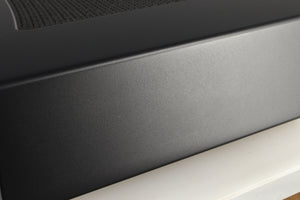 Close up of a used Cambridge Audio CXA81 Series 2 Integrated Amplifier in a lunar grey finish showing light scratching on right side