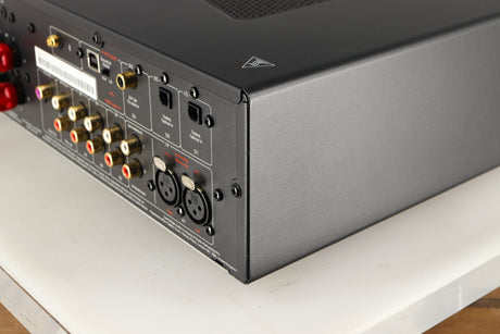 Rear left corner of a used Cambridge Audio CXA81 Series 2 Integrated Amplifier in a lunar grey finish