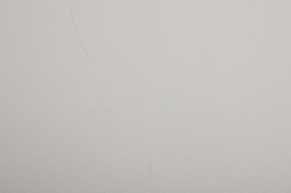 Close up of a used Cambridge Audio CXN V2 Streamer in a silver finish showing scratches on top