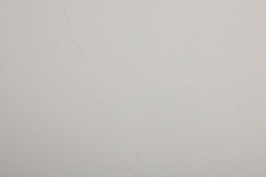 Close up of a used Cambridge Audio CXN V2 Streamer in a silver finish showing scratches on top