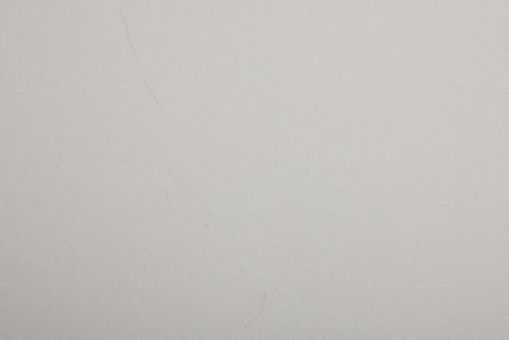Close up of a used Cambridge Audio CXN V2 Streamer in a silver finish showing scratches on top