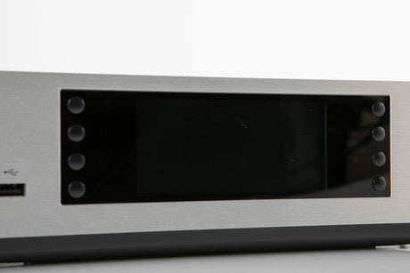 Close up of a used Cambridge Audio CXN V2 Streamer in a silver finish showing scratches on screen