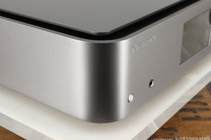 Front left corner of a used Cambridge Audio Edge NQ Network Pre Amplifier in a grey finish