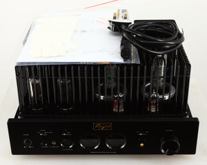 Top of a used Cayin HA-6A Headphone Amplifier in a black finish showing Manual, Mains Cable, 2x Gloves and 4x Spare Fuses