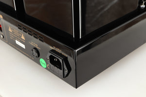 Rear left corner of a used Cayin HA-6A Headphone Amplifier in a black finish