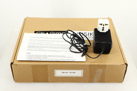 Box for a used Charisma Audio Musiko Phonostage in a black finish showing Manual and PSU