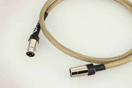 Close up of a used Chord Company Epic Interconnect DIN-DIN Interconnect Cable 1.0m showing connectors