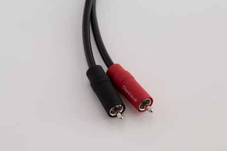 Close up view of a used Chord Company Epic X Aray 1.0m 2 RCA - Din Interconnect Cable