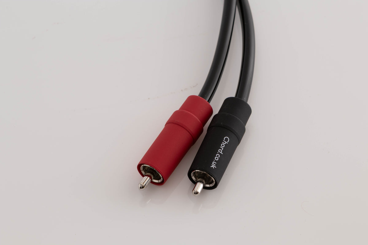 Close up view of a used Chord Company Epic X Aray 1.0m 2 RCA - Din Interconnect Cable