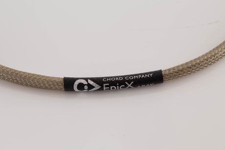 Close up view of a used Chord Company Epic X Aray 1.0m 2 RCA - Din Interconnect Cable