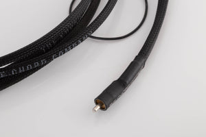 Close up view of a used Chord Company Signature 2.0m RCA-RCA Interconnect with Earth cable
