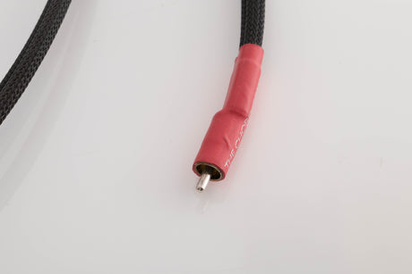 Close up view of a used Chord Company Signature 2.0m RCA-RCA Interconnect with Earth cable