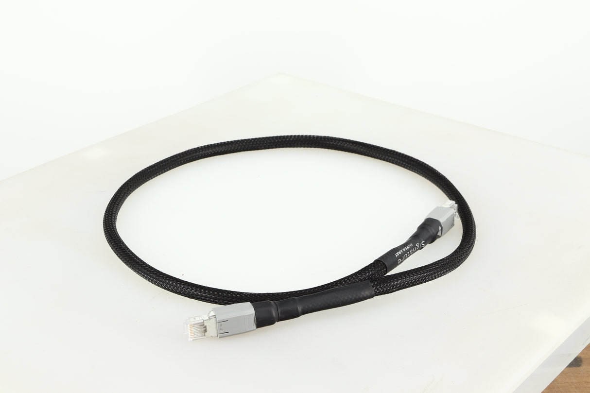 Front left angle of a used Chord Company Signature Super Aray Digital Streaming Cable 1.0m in a black finish