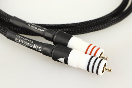 Close up of a used Chord Company Signature Tuned ARAY RCA-RCA Interconnect Cable 1.0m showing connectors