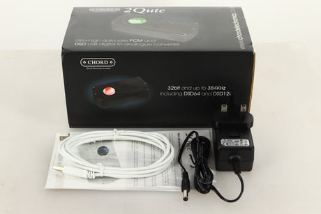Box of a used Chord Electronics 2Qute DAC in Black finish with mains cable, manual, and USB cable 