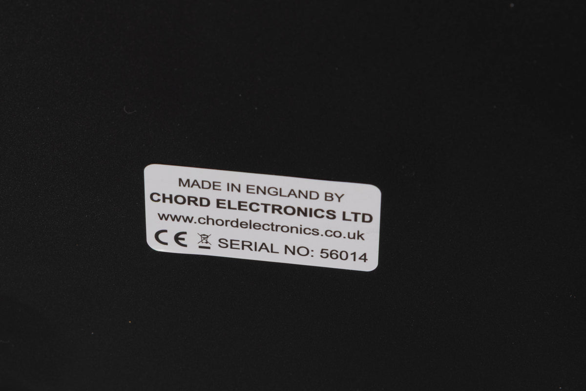 Close up of a used Chord Electronics Bertti Power Amplifier in a Black finish showing serial number