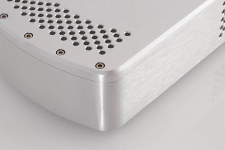 Front left corner of a used Chord Electronics Etude Power Amplifier in a Silver finish