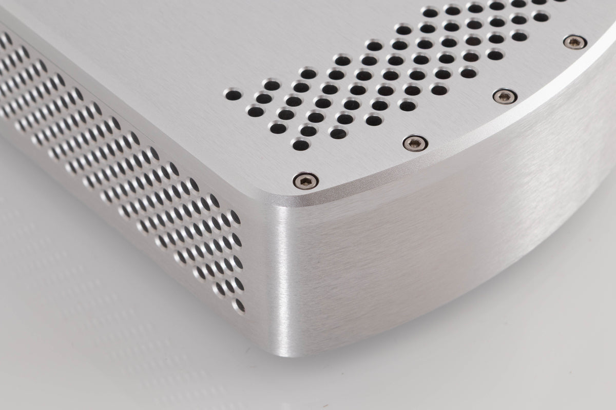Front right corner of a used Chord Electronics Etude Power Amplifier in a Silver finish