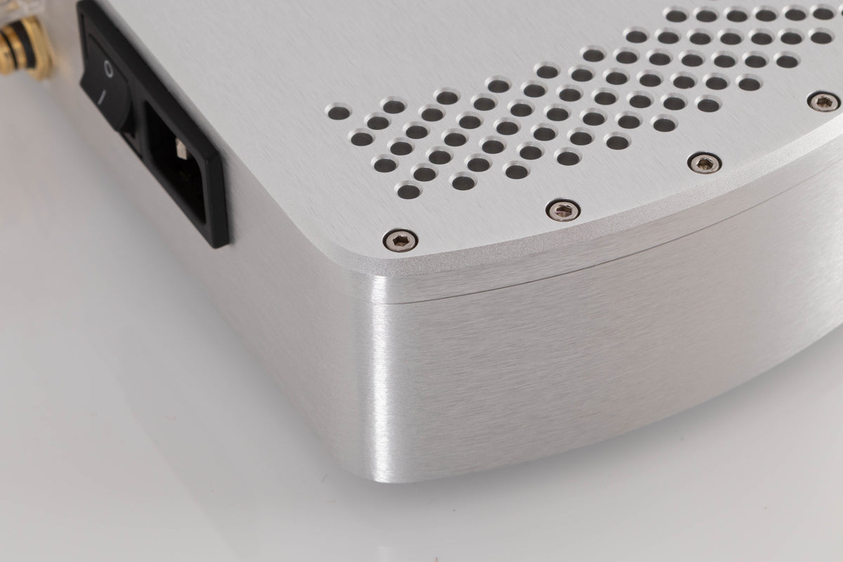 Rear left corner of a used Chord Electronics Etude Power Amplifier in a Silver finish