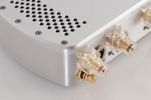 Rear right corner of a used Chord Electronics Etude Power Amplifier in a Silver finish