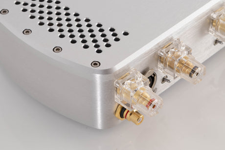 Rear right corner of a used Chord Electronics Etude Power Amplifier in a Silver finish