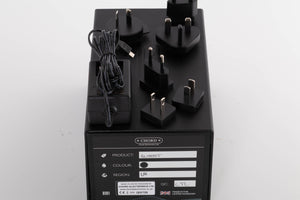 Box for a used Chord Electronics Qutest Digital Analogue Converter in a Black finish showing PSU, Mains Plug and Schuko Plug