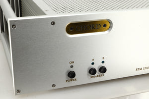 Close up view of a used Chord Electronics SPM1200C Power Amplifier in Silver finish