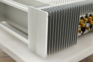 Rear left corner view of a used Chord Electronics SPM1200C Power Amplifier in Silver finish
