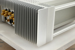 Rear right corner view of a used Chord Electronics SPM1200C Power Amplifier in Silver finish