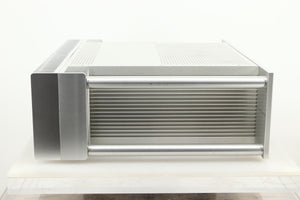 Side view of a used Chord Electronics SPM1200C Power Amplifier in Silver finish