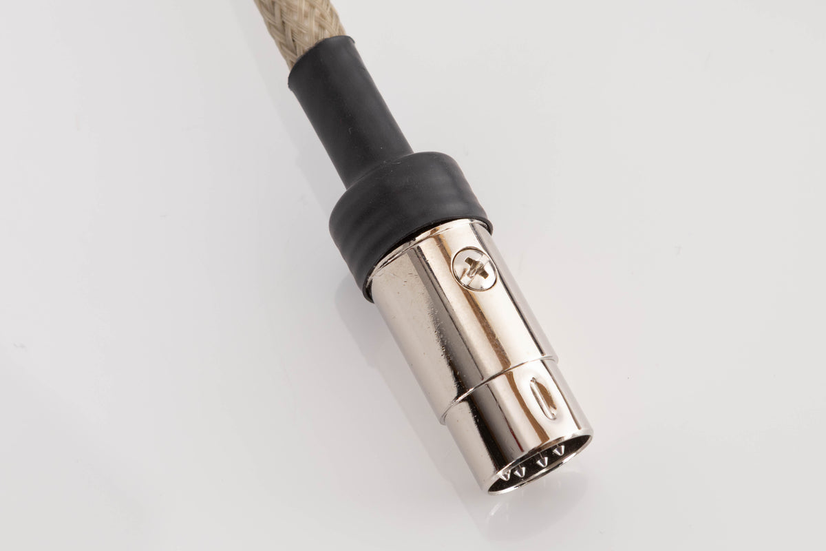Close up of a used Chord Epic X 2RCA-DIN 1.0m Interconnect Cable showing connector