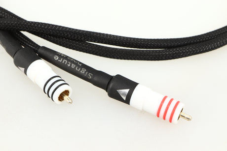 Close up of a used Chord Signature Tuned Aray Interconnect Cable 1.0m RCA-RCA showing connectors