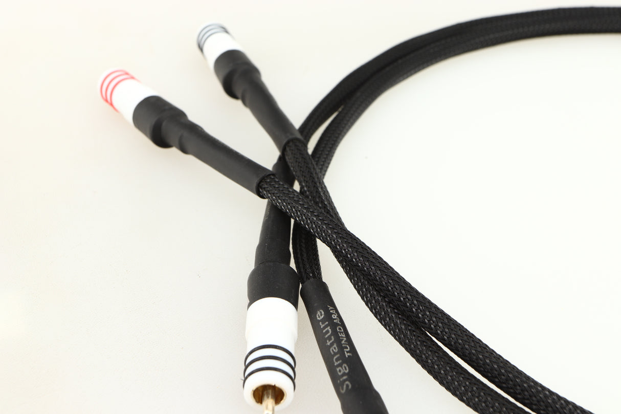 Close up of a used Chord Signature Tuned Aray Interconnect Cable 1.0m RCA-RCA showing connectors