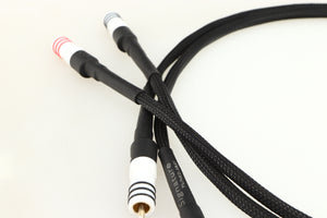 Close up of a used Chord Signature Tuned Aray Interconnect Cable 1.0m RCA-RCA showing connectors